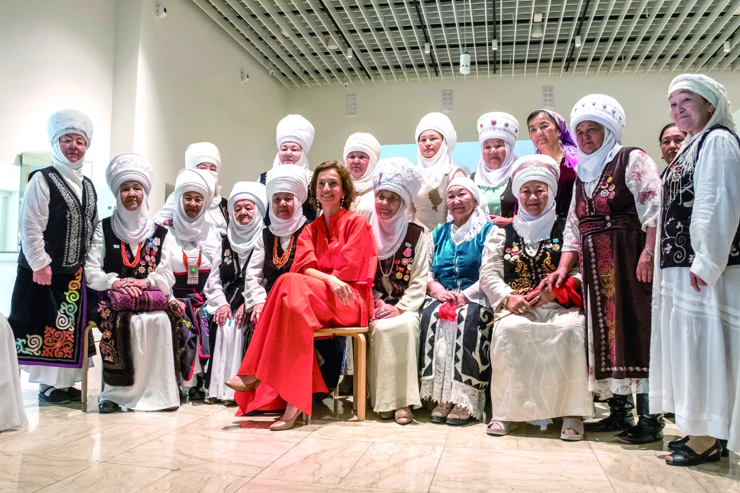 UNESCO Director-General Ms. Audrey Azoulay with elechek community representatives during her visit to the Kyrgyz Republic in 2023. Various ICH communities took part in an exhibition celebrating the 20th anniversary of the UNESCO 2003 Convention © National Commission of the Kyrgyz Republic for UNESCO