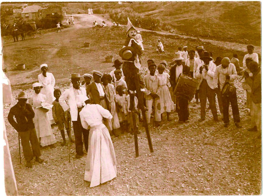 Stilt Walker and Tuk Band, Rural Barbados, 1900. BMHS, (Lennox Honychurch Collection) © BMHS