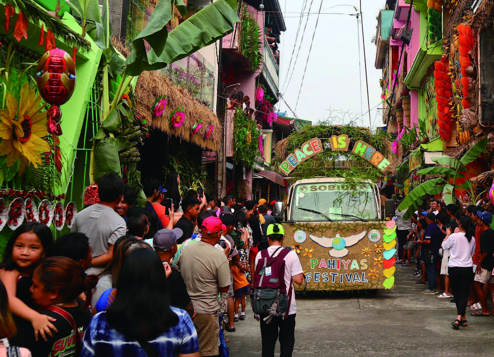 In the Philippines, the Pahiyas Festival decorated homes with kiping, colorful rice-based wafers. © Patrickroque