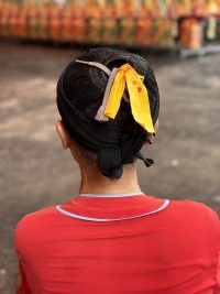 Talisman in the hair © Courtesy of Angela Sim