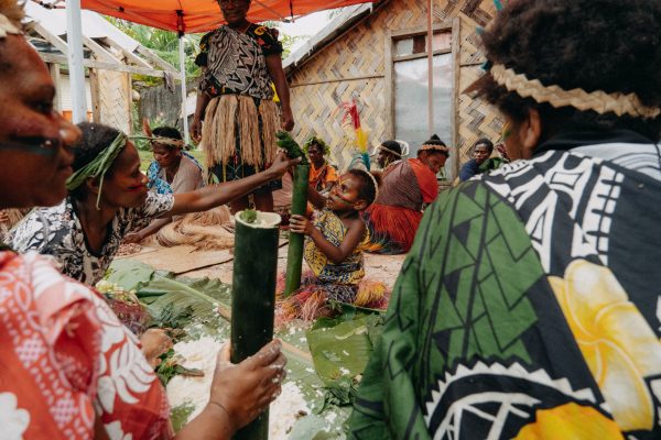 Women and Children participating in food storage practice © Senolita Fonokalafi, Jean Pascale Wahe